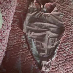 Thick, pink , comfortable One piece swimsuit for girls .